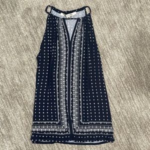 Navy blue and white sleeveless top